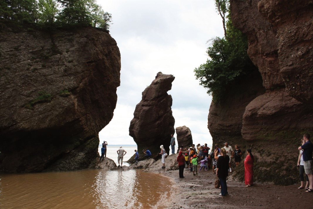 Hopewell Rocks with highest tide in the world, the Bay of Fundy tide receeding