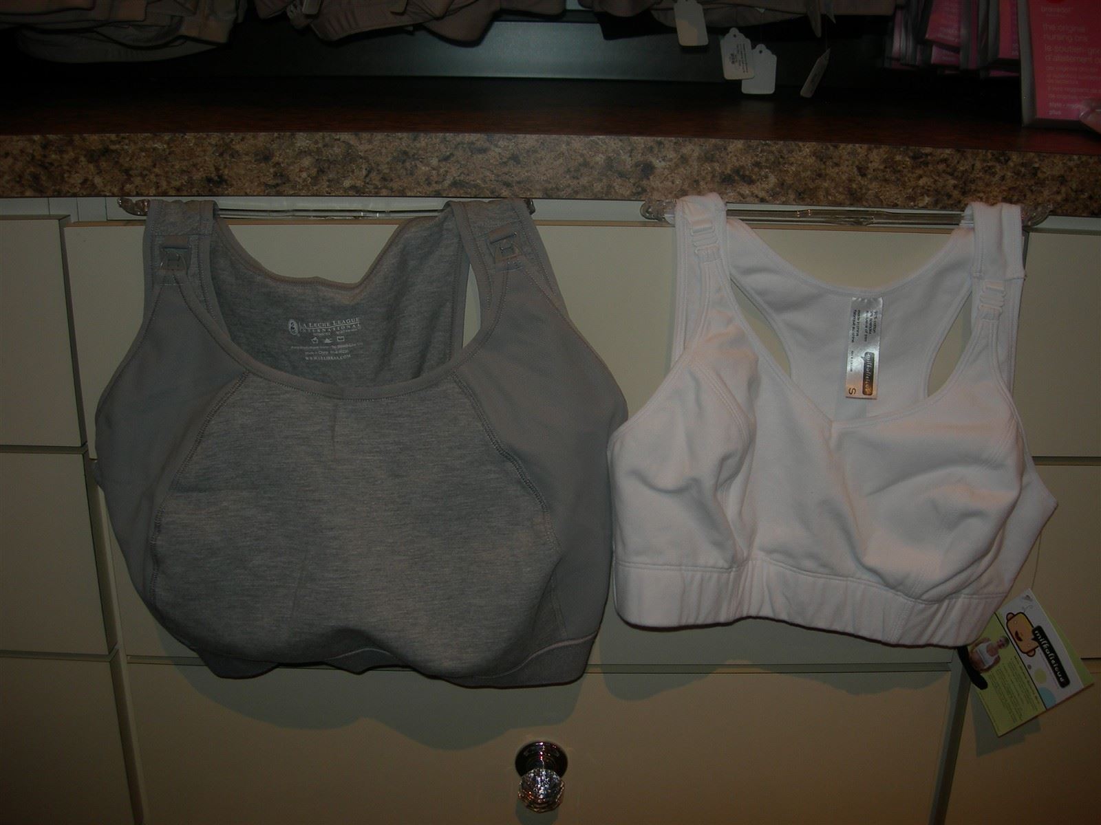 Sports Bras : Some comfy and supportive options: 
By La Leche League in Gray;
By  Milkalicious in White