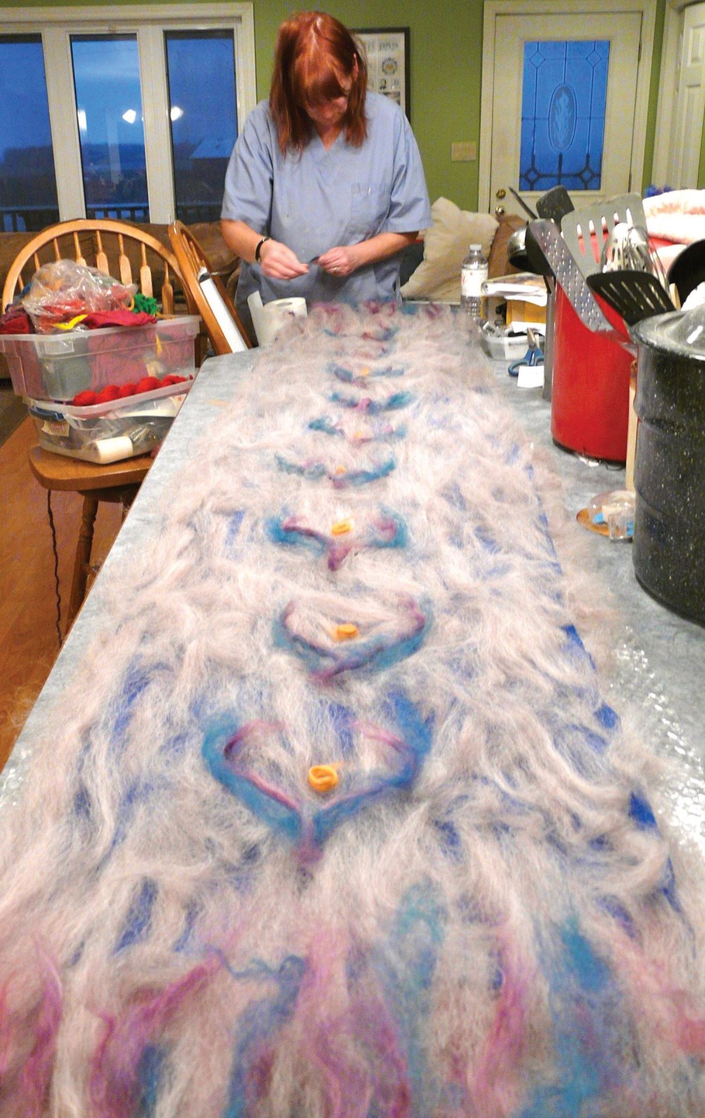 Working on the Nuno silk scarf - placing the alpaca fibre