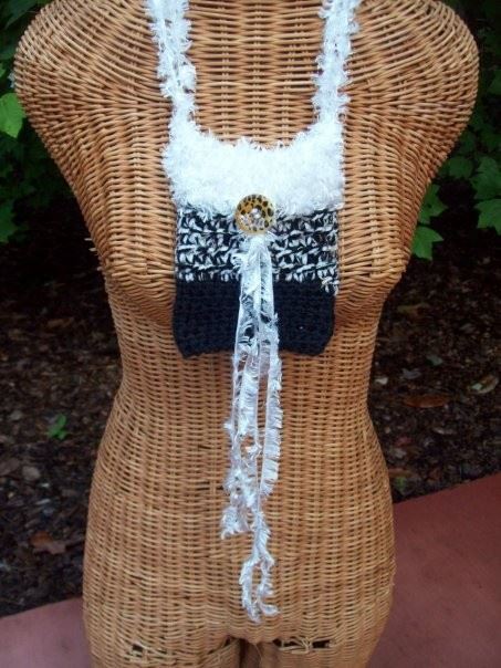 A Defining Moment : Novelty yarns and fringe completes the youniqueness of this piece  $30.00