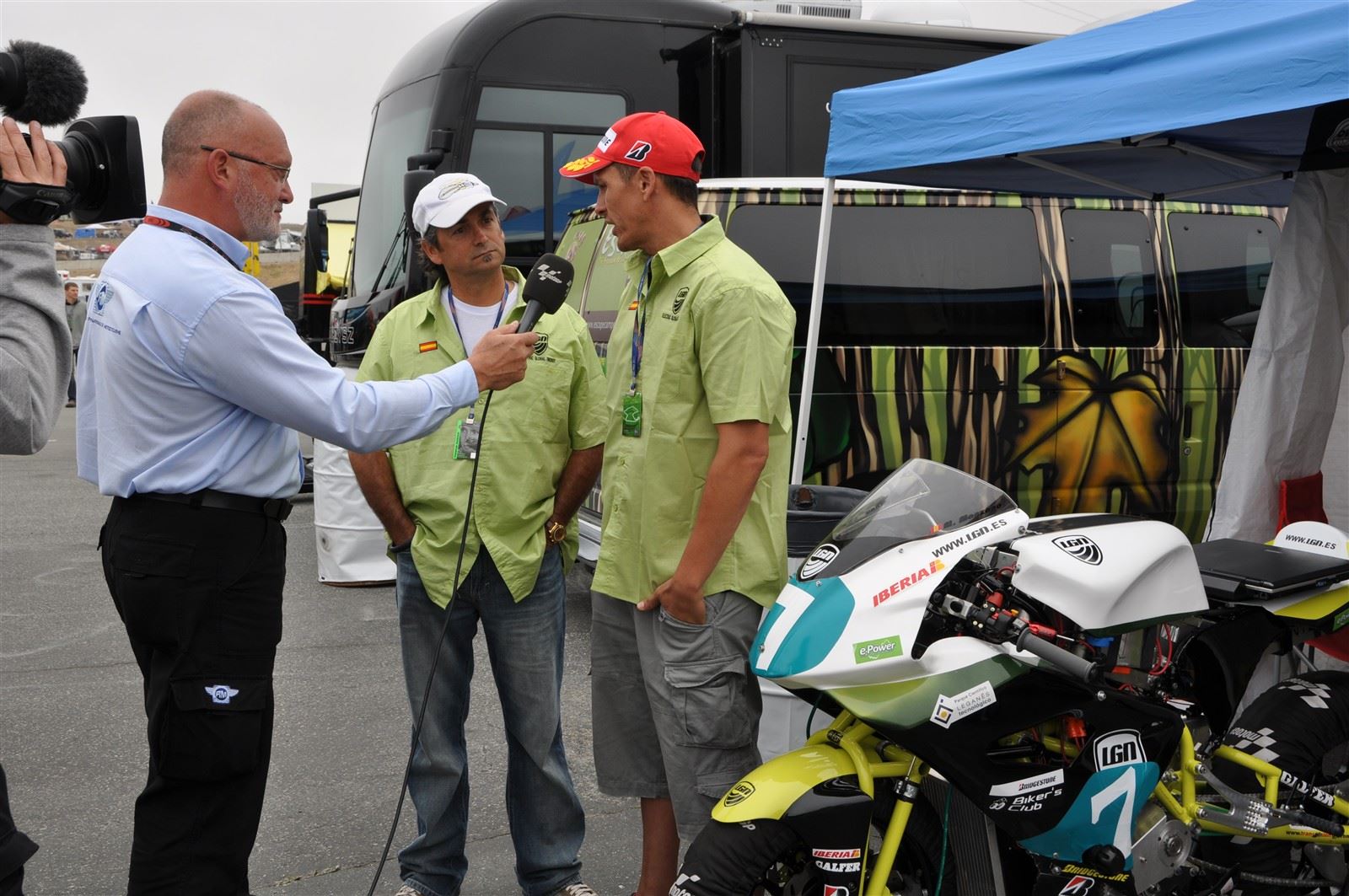 EP Designer Rolando Ortiz & LGN Team Pilot Marcelino Manzano being interviewed by FIM at the 2011 MotoGP Laguna Seca.