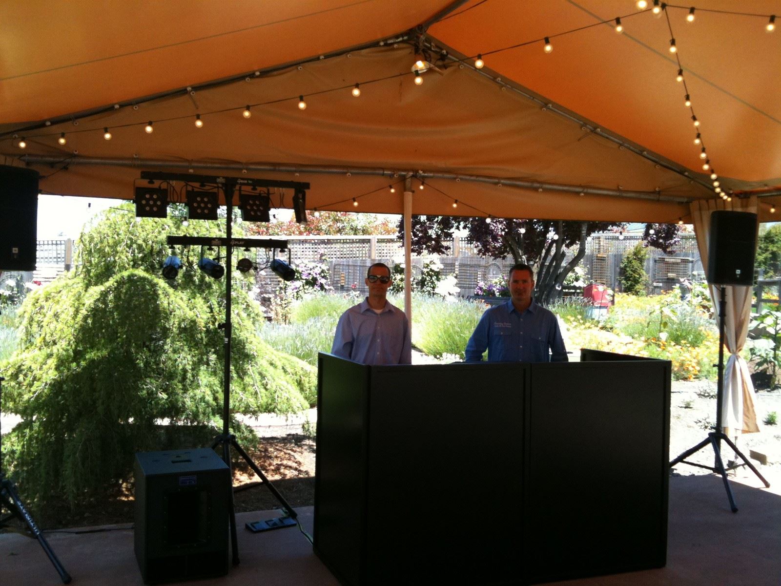 Sova Gardens Wedding - Runaway DJ and Events : Matt making last minute adjustments to my dj booth.
