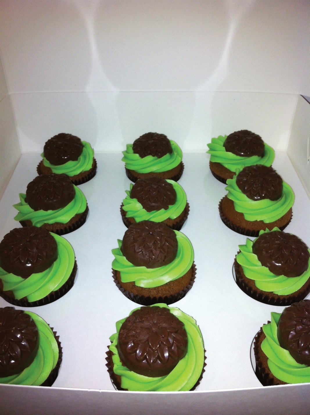 Assorted cupcakes 
www.peekaboopartycakes/blog
