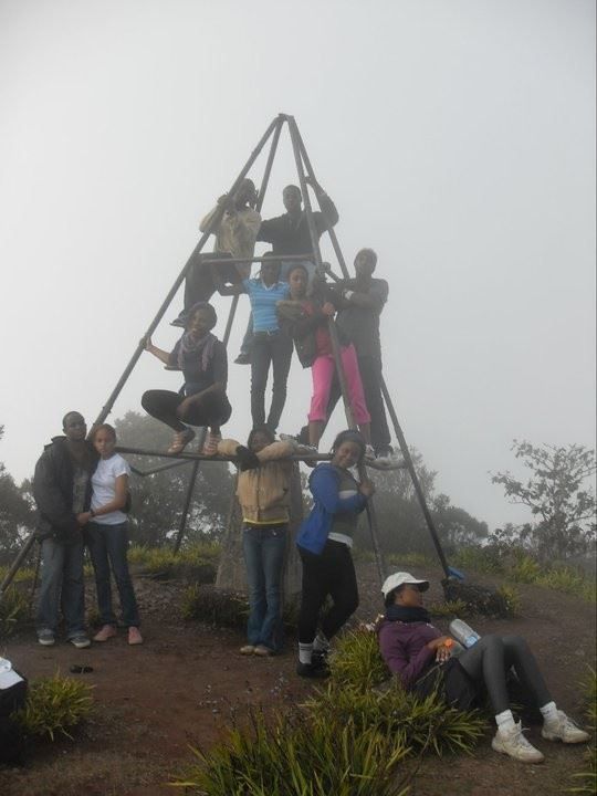 We are here Amen : We did it and now the proof!. Vistaprint staff on the top of the Blue Mountain