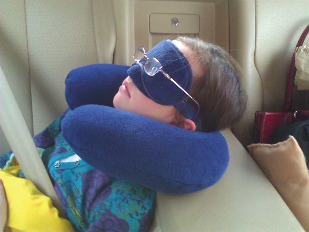 My daughter has road-trip-sleeping all figured out.