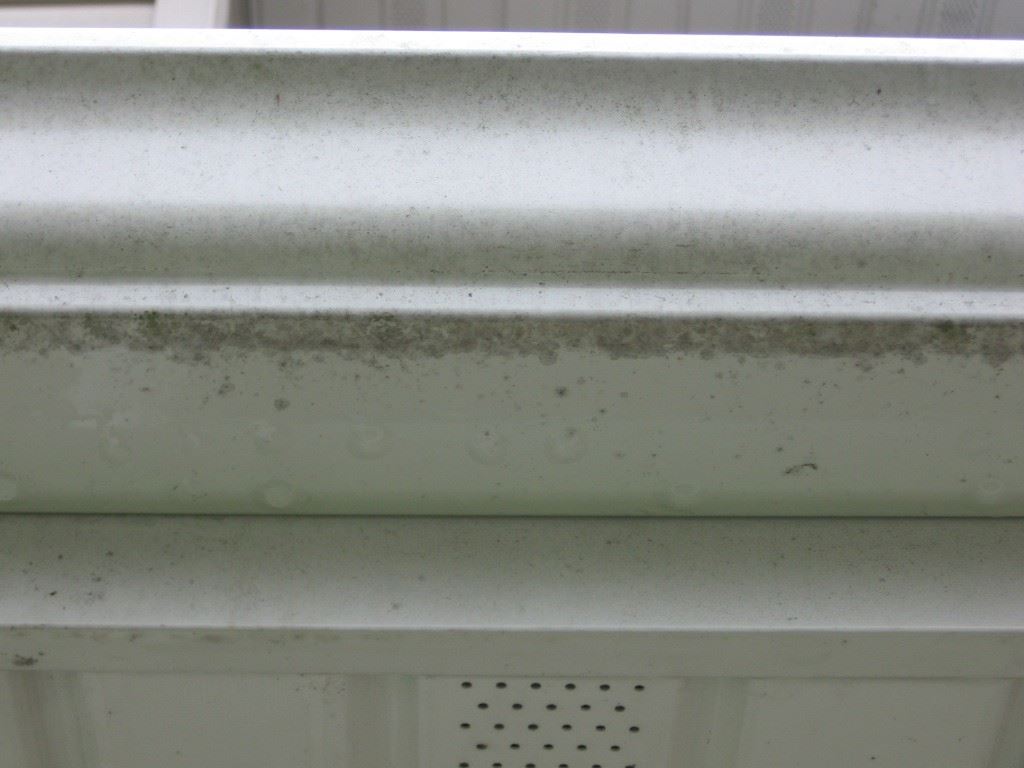 Stained black gutters
