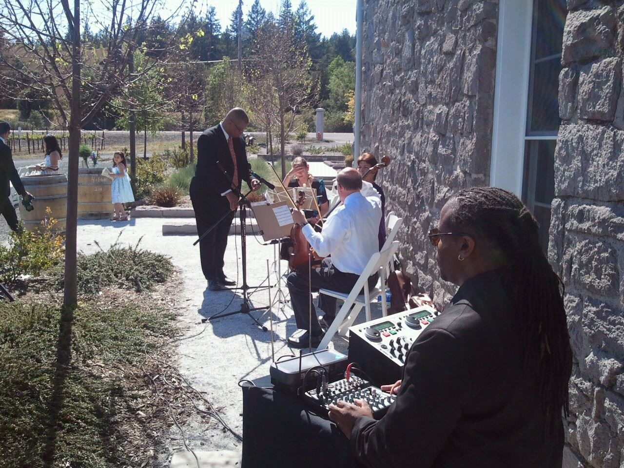 Runaway DJ Services : We used wireless mics to get the sound out for this string treo.