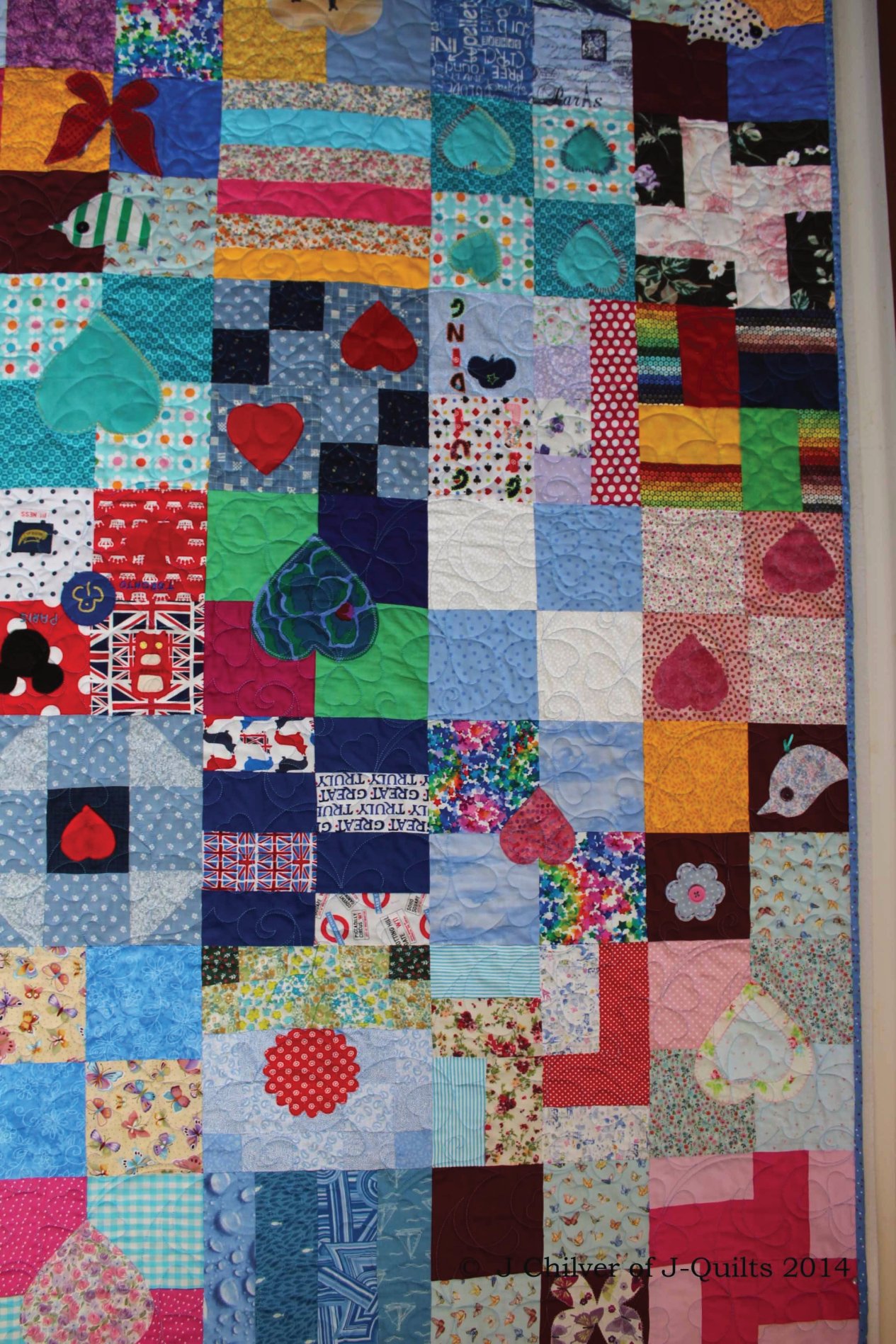 Lovely scrappy nature of the quilt