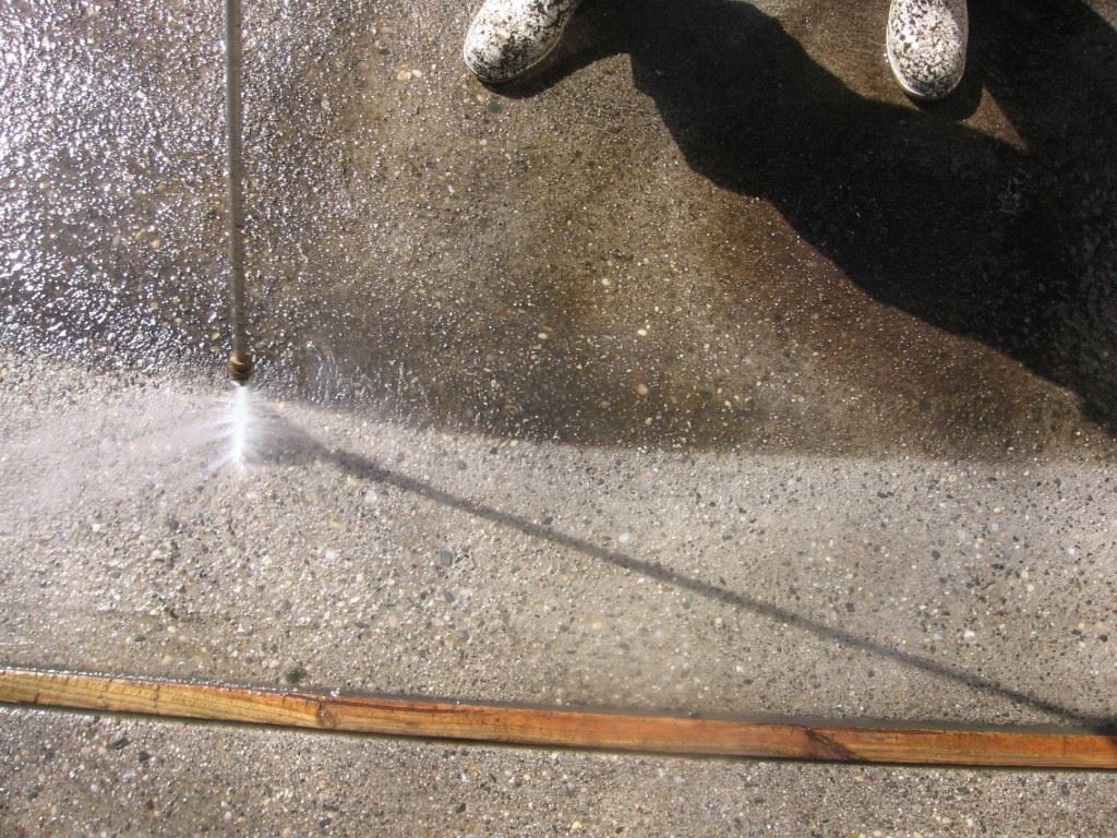Power washing concrete patio
