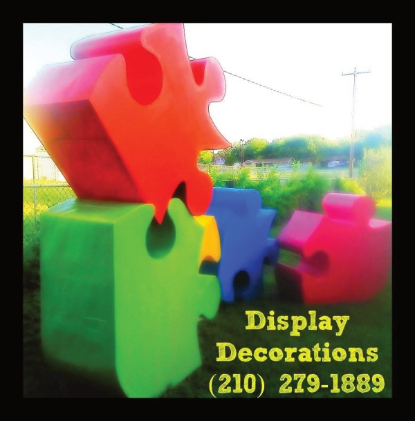 parade float large puzzle displays for autism walk event in Texas by The Cascaron Store