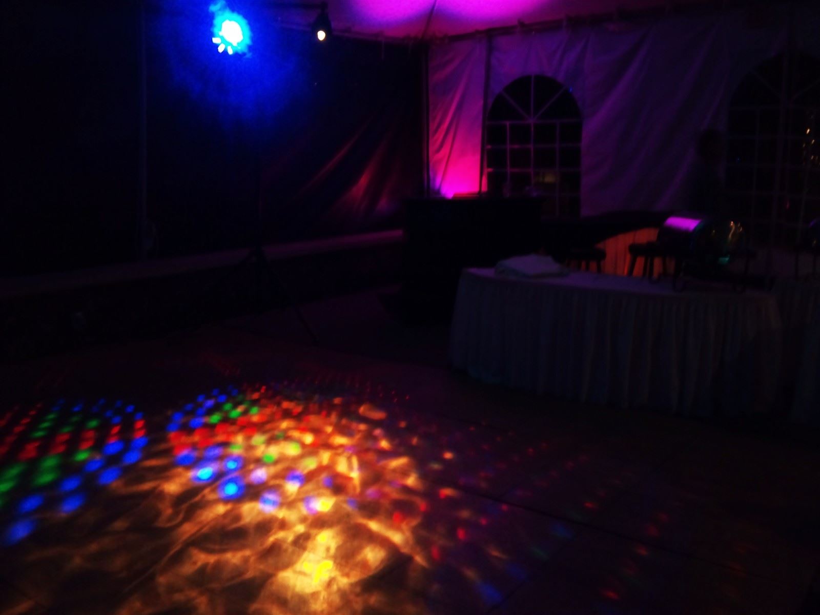 Runaway DJ Services : Multiple dance lights set the floor for dancing all night long.
