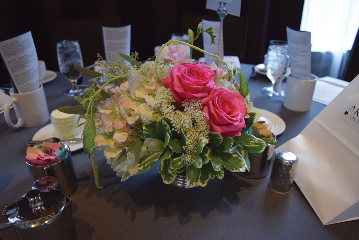  : ... Hydrangea, Queen Anne's Lace, roses, and hanging amaranthus were among the blooms in these silver Revere Bowls.  Members of the KMFA Board were given these centerpieces as gifts to take home after the brunch.