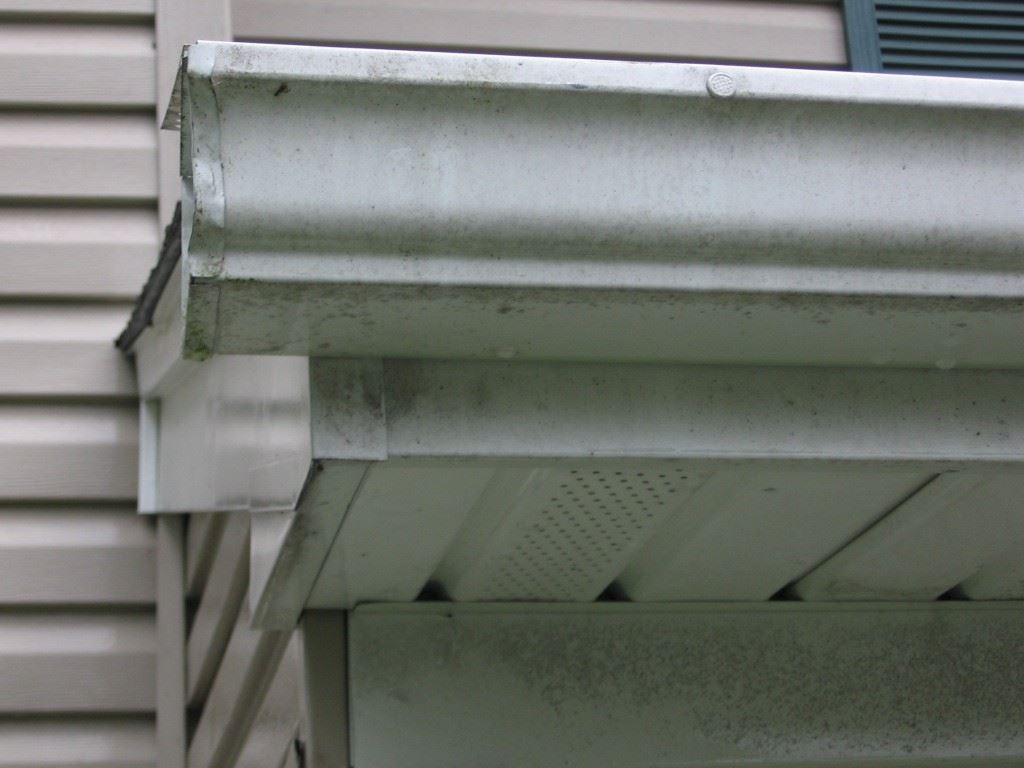 Stained gutters : power washing alone won't remove the stains