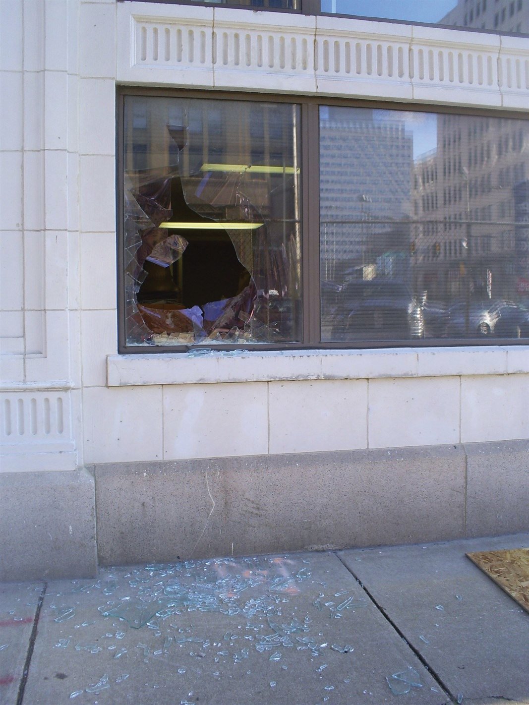 Broken window in center city Philadelphia Pa