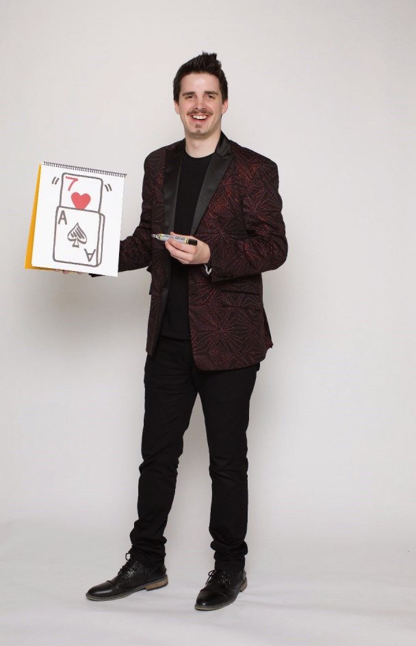 Neal Chamberlain, magician, has always been enamored with card tricks and is thankful for this massive one to travel with when performing across North Carolina
