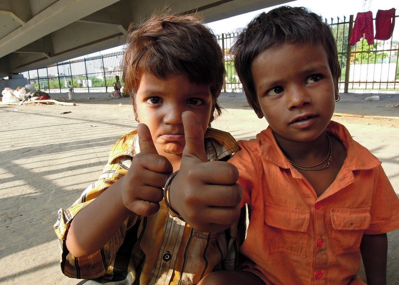 14 Their Tawny Brown Hair Suggests These Two Homeless Street Kids Are Suffering From Malnutrition