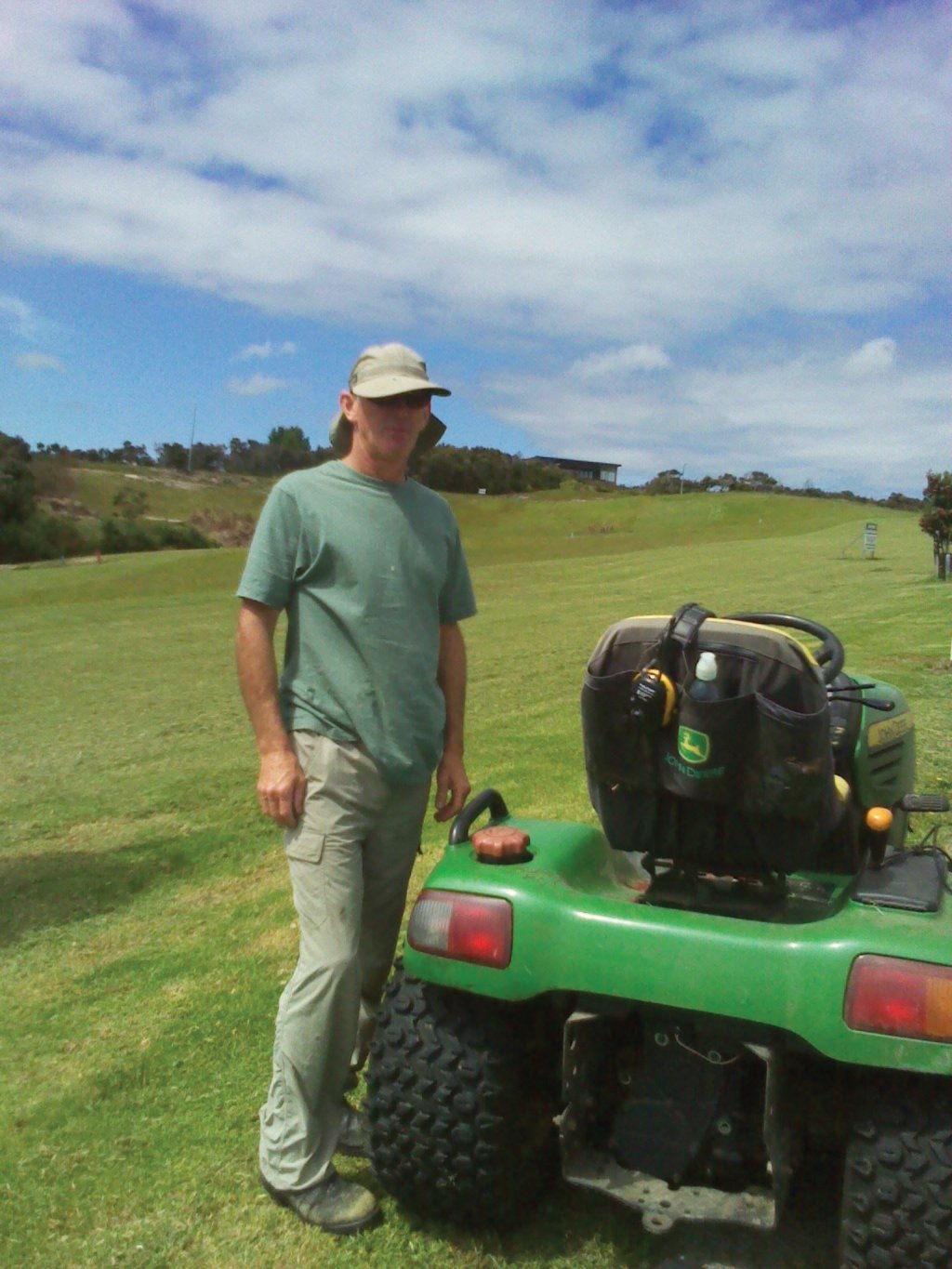 Garry by his John Deere finish mower.