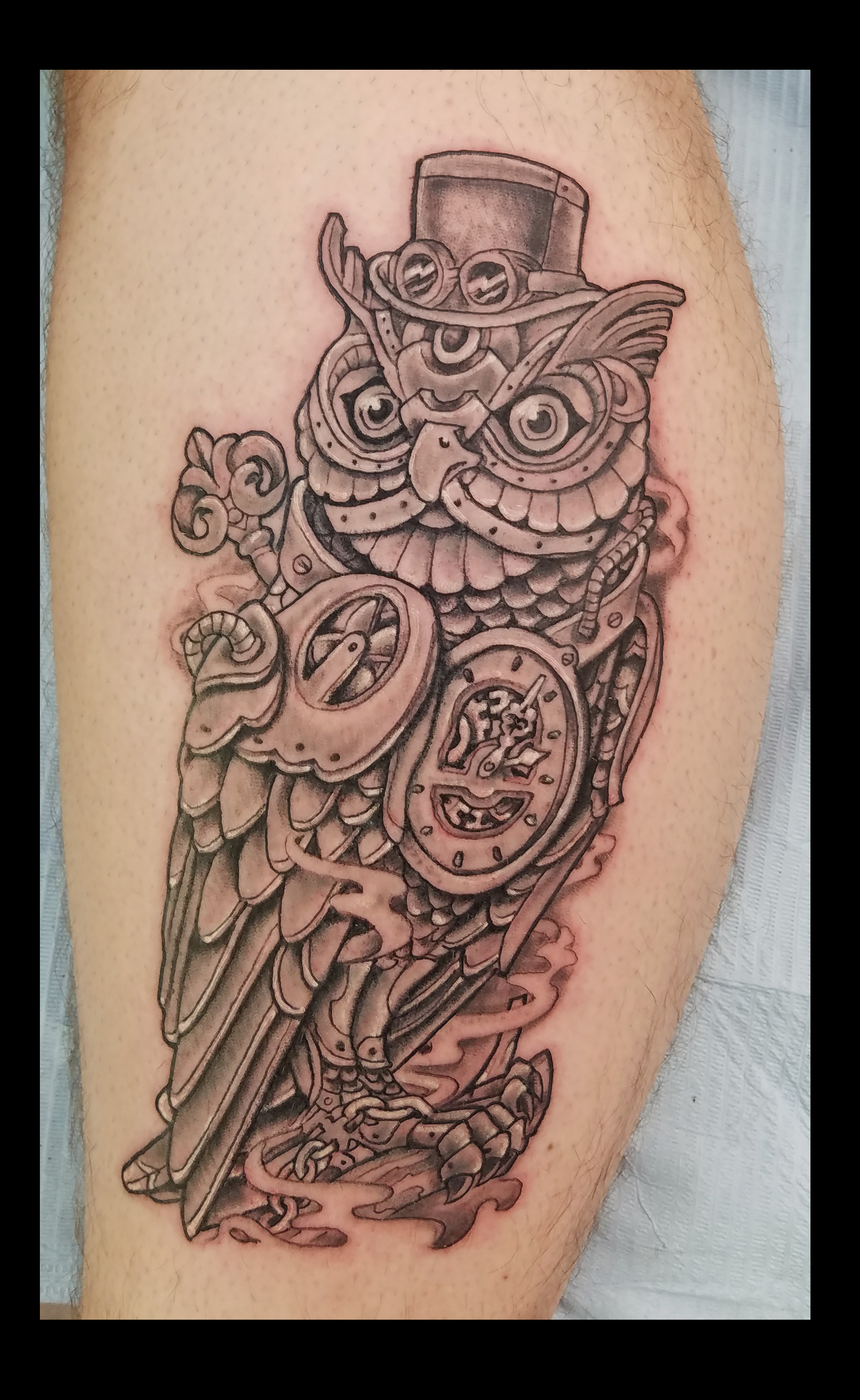 mechanical owl tattoo