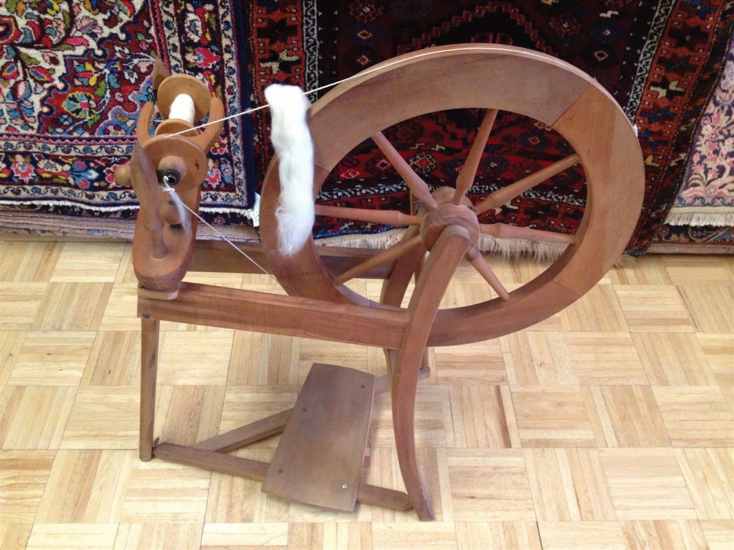 Spinning wheel used by Mr. Kia to spin wool to make yarn for Oriental Rug Repair|Restoration, Antique Oriental Rug Repairing|Restoration, Persian Rug Repair|Restoration. 