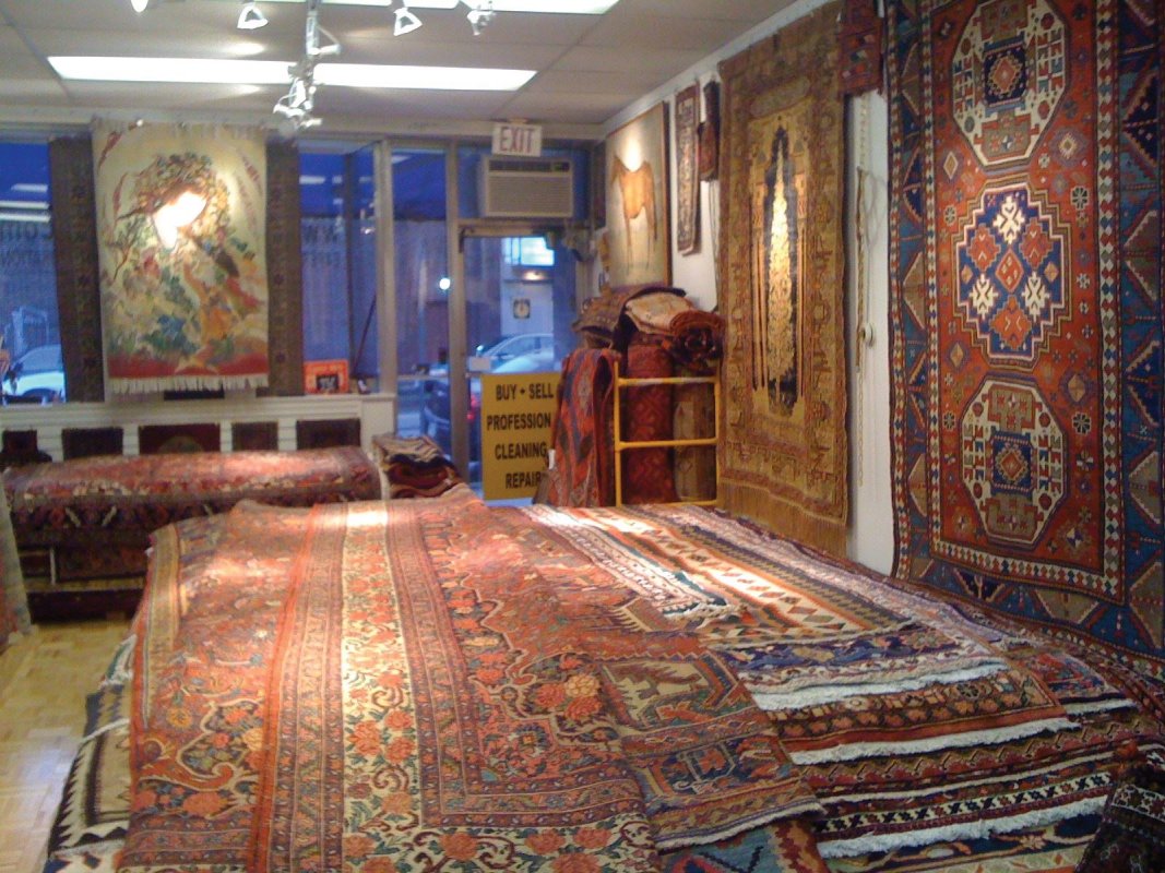 View of the showroom showing many of hand selected collection of Unique and Antique Oriental Rugs And Persian Rugs
