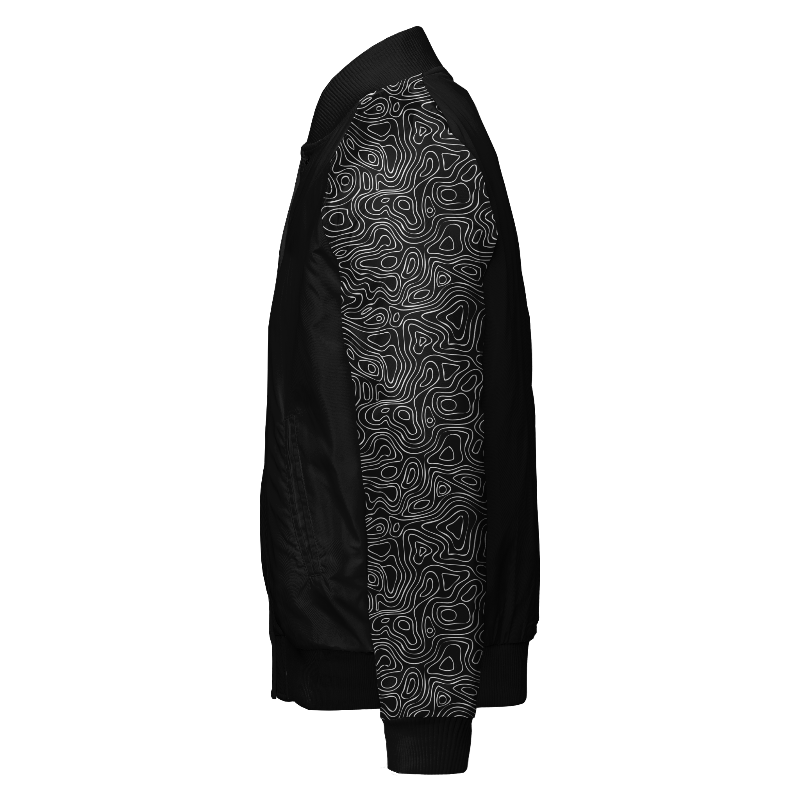 Spray proof left of Reversible Varsity Jacket  in Black with Topographic sleeves in Black and White and ribbing in Black and Light Grey